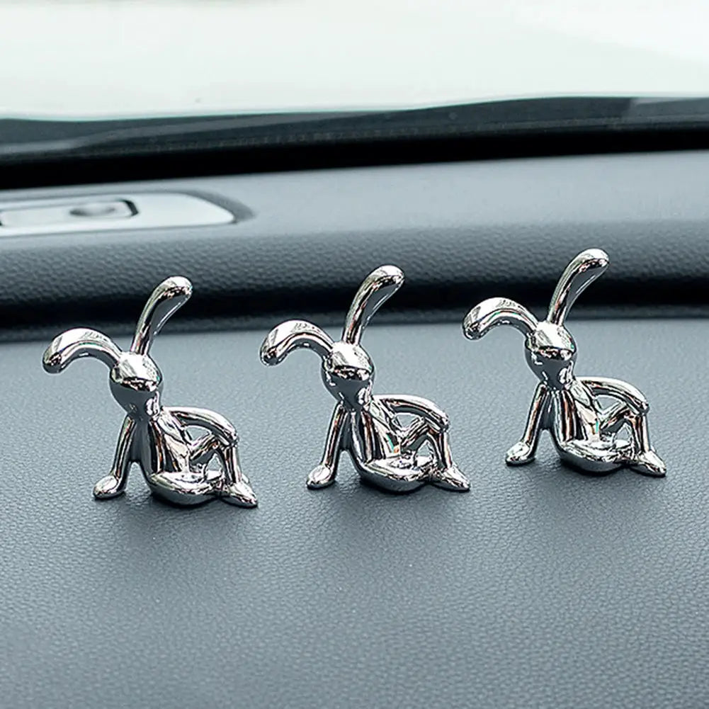 Rabbit car interior decor set by Simples Market; 3 chrome bunny figurines