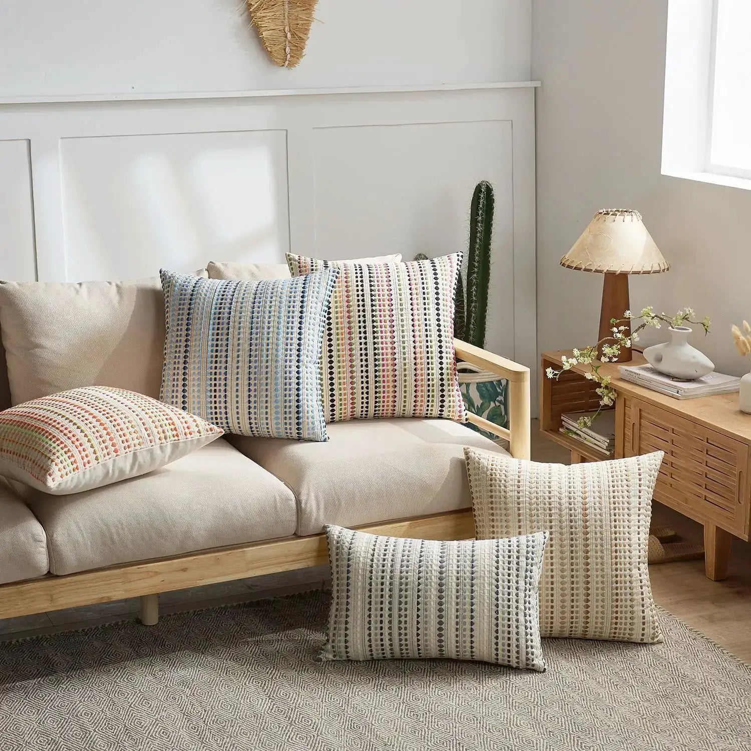 Boho Dots Jacquard Cushion Cover 45x45cm with zipper; Simples Market on beige sofa in grey, ivory, blue and orange.