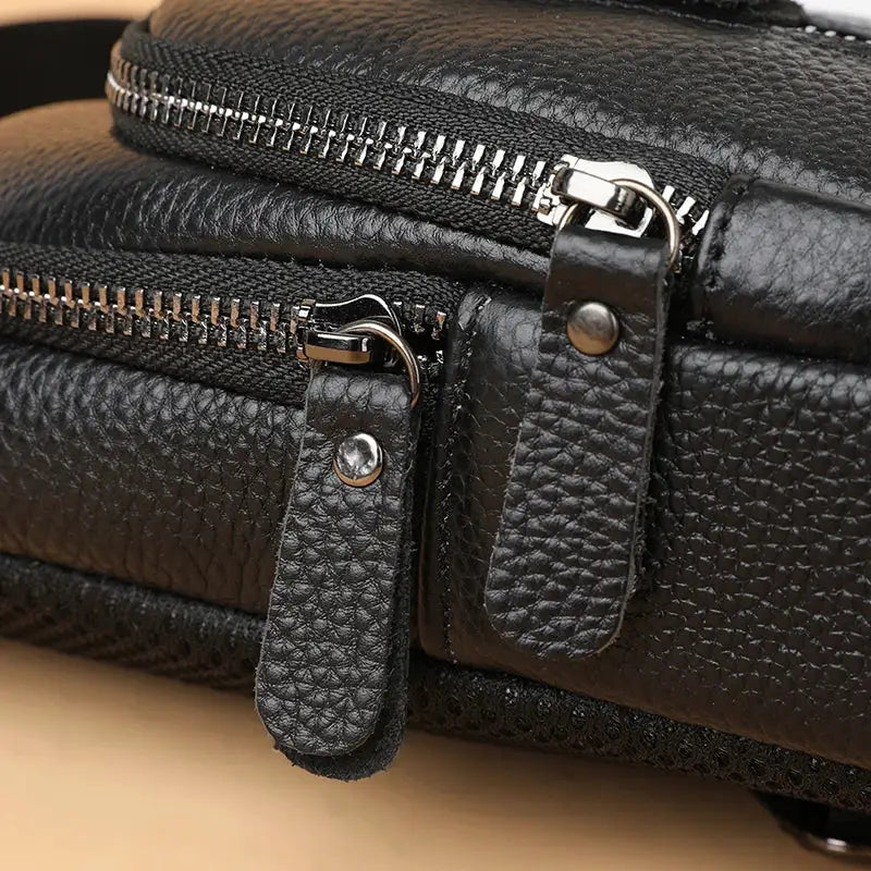 Men's black genuine leather chest bag by Simples Market with twin zippers