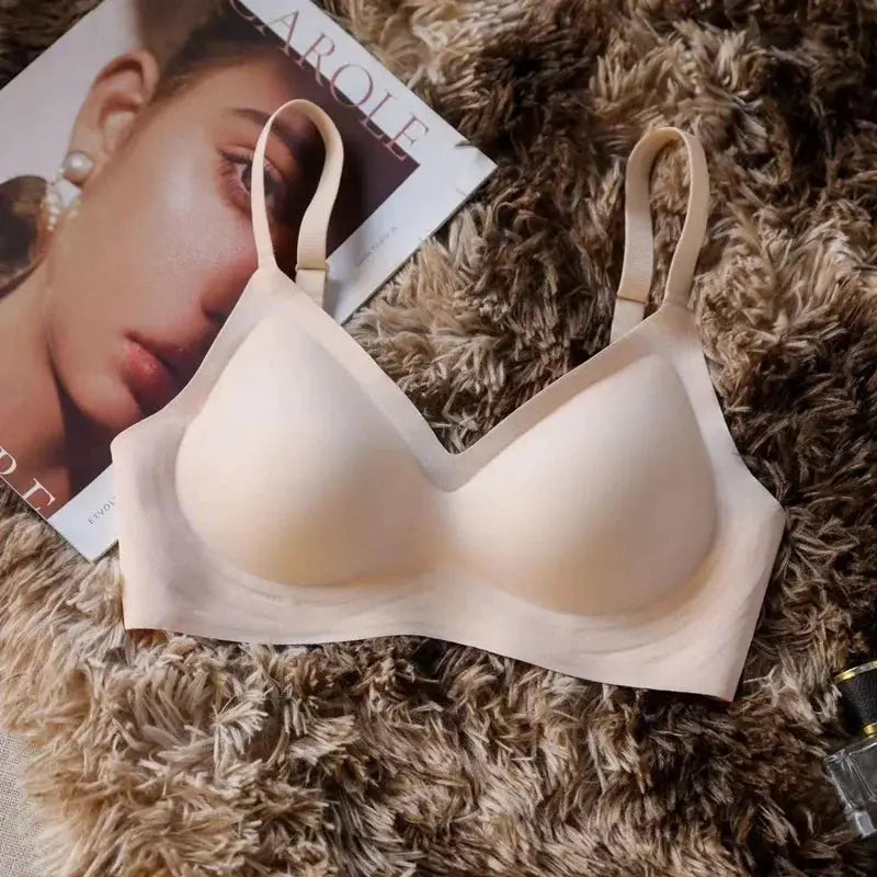 Seamless beige bra with molded cups and soft support by Simples Market