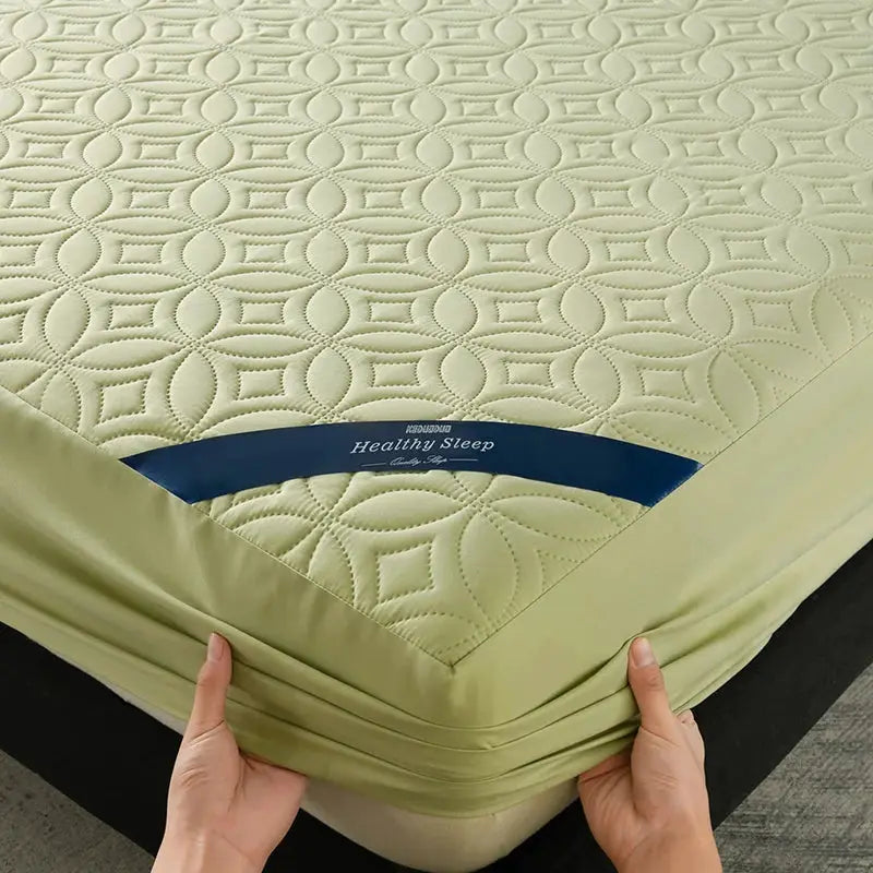 Simples Market quilted mattress protector; waterproof, antibacterial, breathable, 30cm deep pocket, light green.