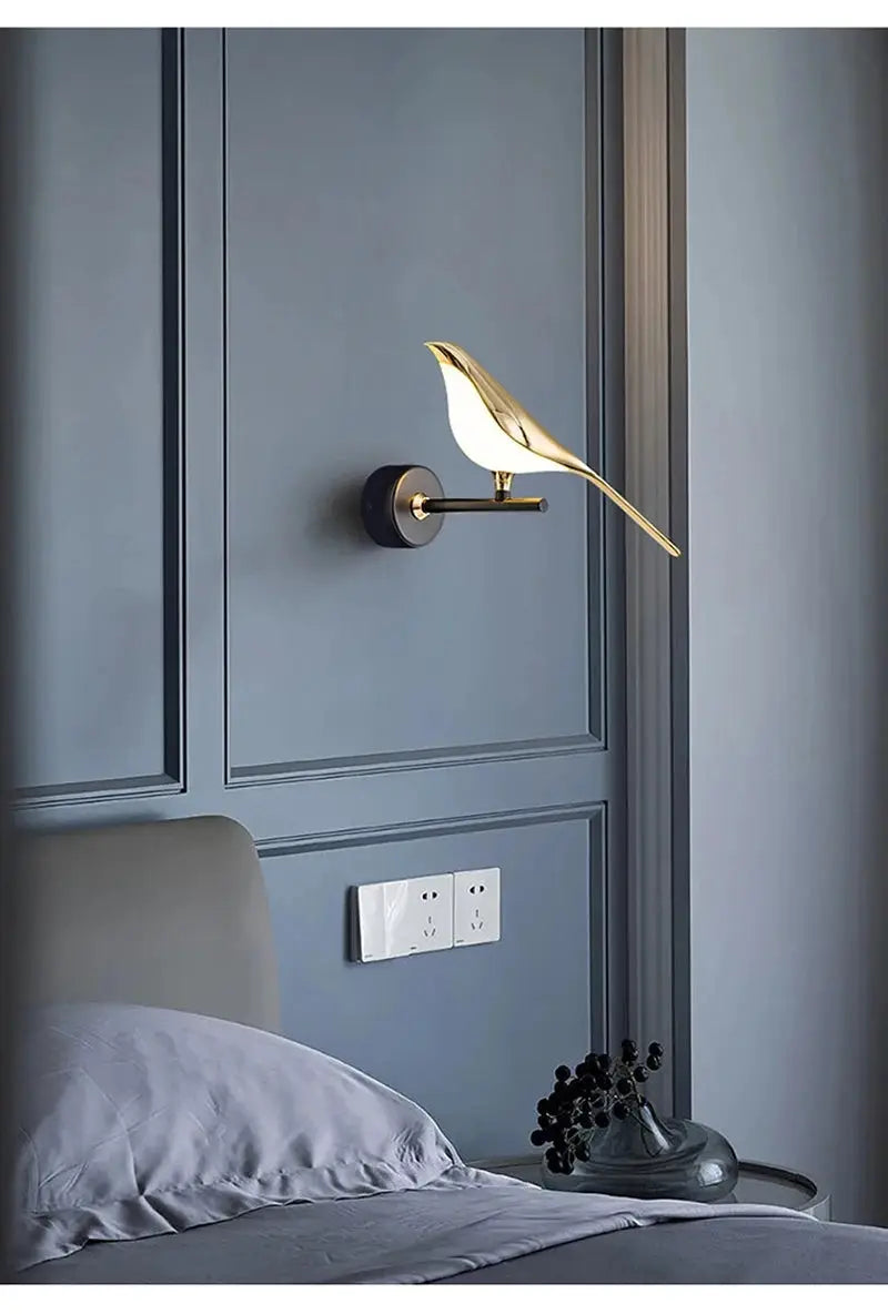 Modern LED wall lamp magpie bird sconce, gold finish, wall-mounted indoor lighting.