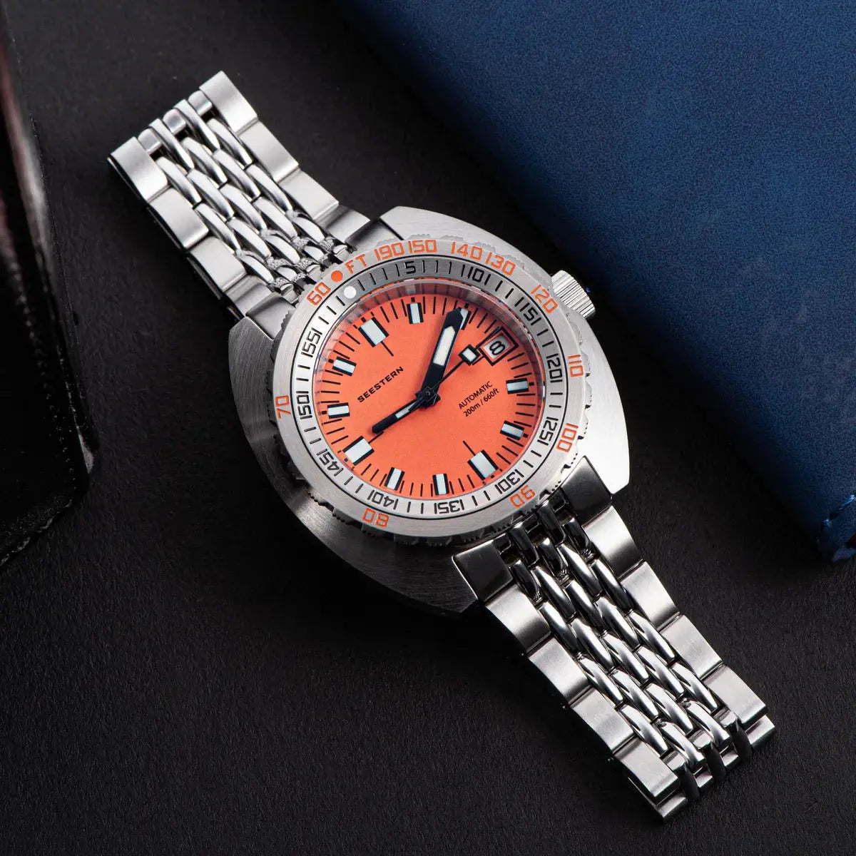 Seestern diver watch with orange dial and stainless steel bracelet, 200m water resistance