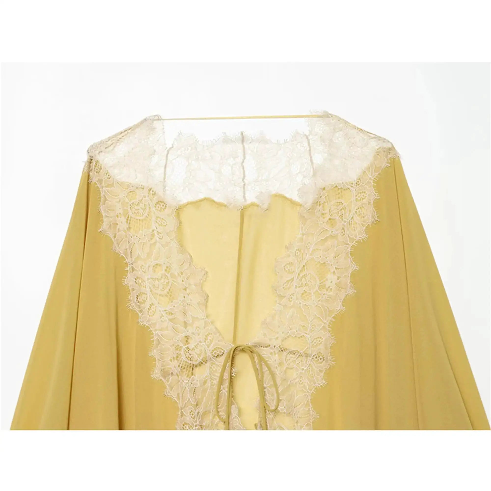 Women's lace patchwork lantern-sleeve blouse in yellow with sheer lace panels and tie waist