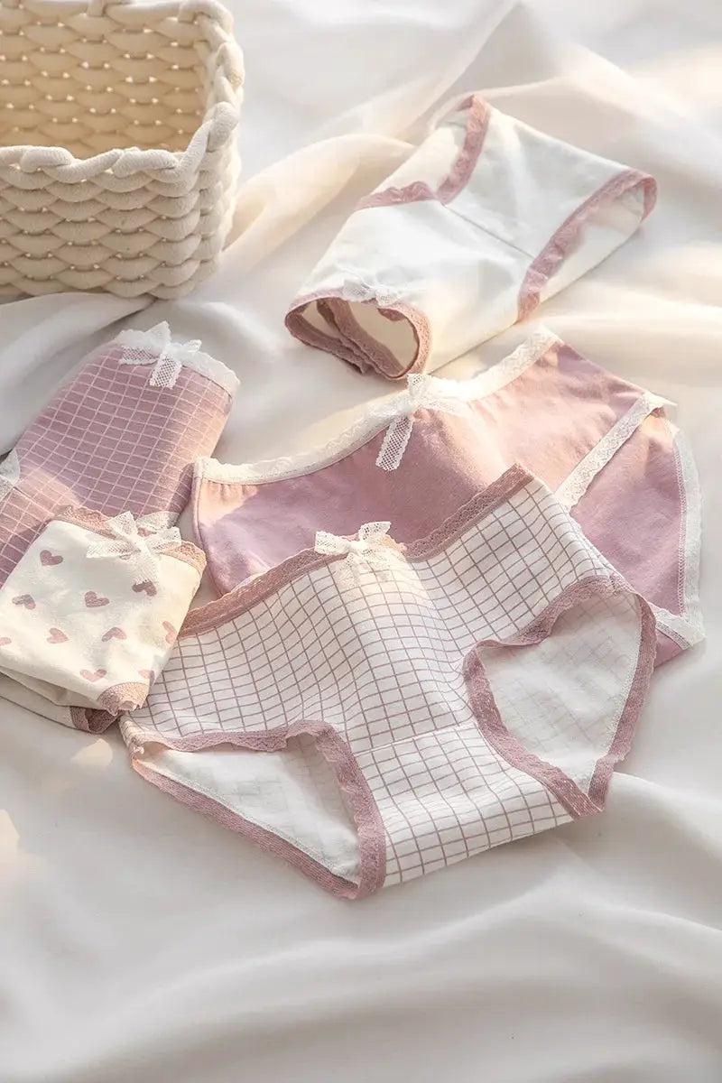 5-piece set of Simples Market cotton women's panties in pink/white with lace trim and bows.