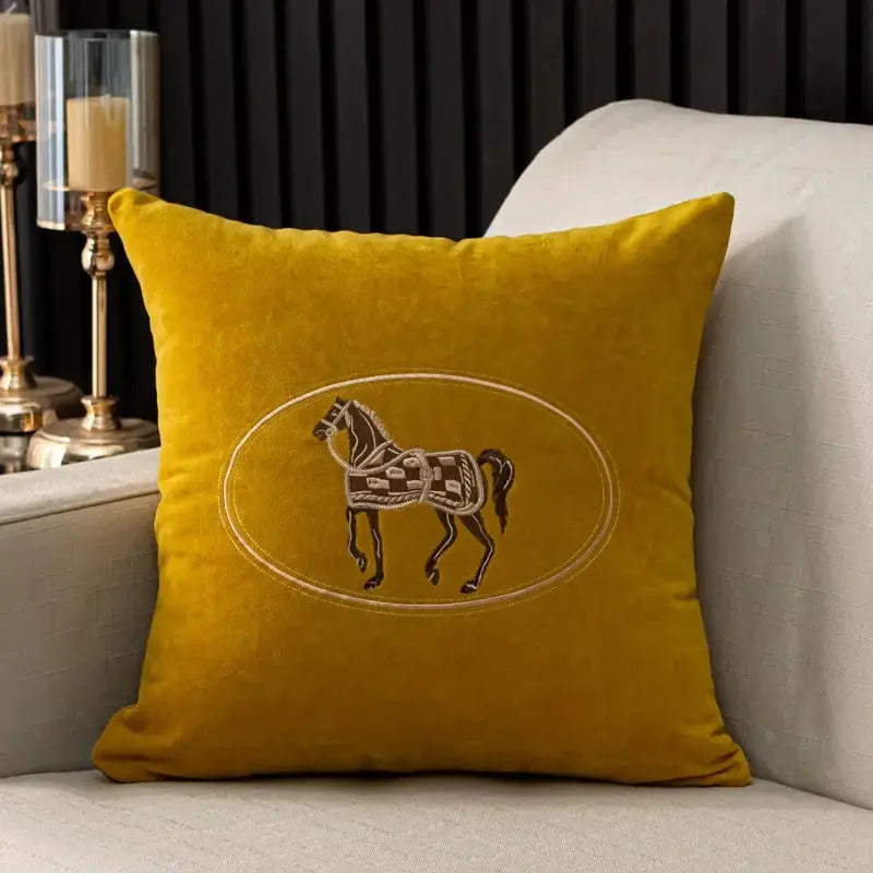 Cushion cover Simples Market, mustard yellow velvet with hand-embroidered horse inside oval, 45x45 cm.