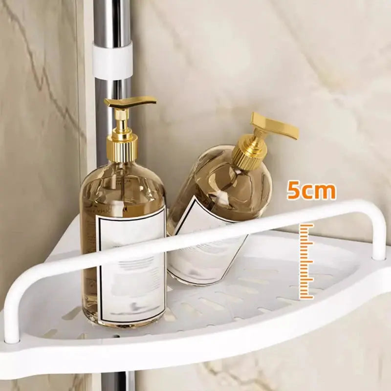 Simples Market stainless steel corner shower organizer with white shelf and two gold pump bottles