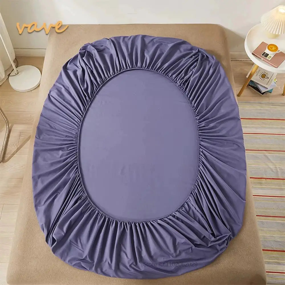 Purple full-size cotton fitted sheet with elastic bands.