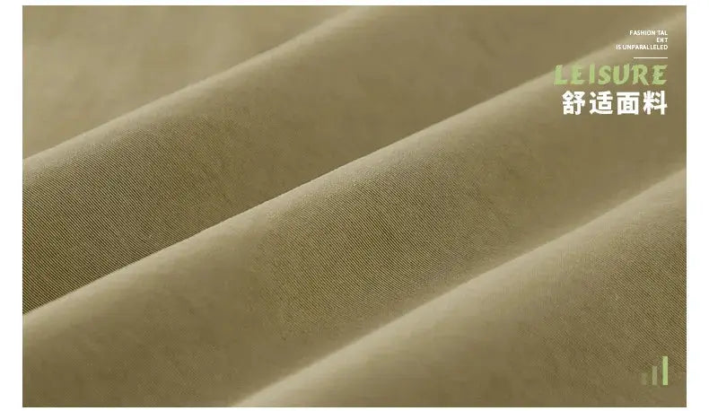 Khaki fabric close-up with soft folds; LEISURE watermark in corner.