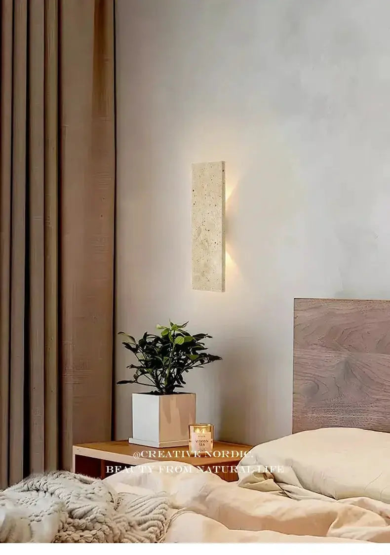 Outdoor waterproof stone wall lamp; vertical beige natural stone finish with warm LED light