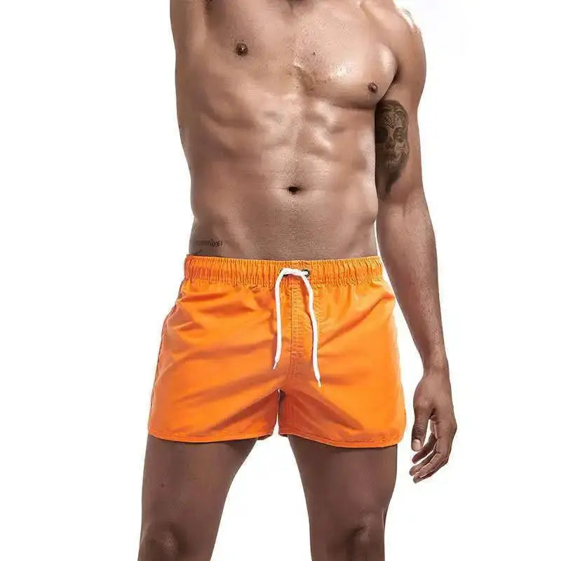 Simples Market men's orange quick-dry swim trunks with white drawstring and pockets