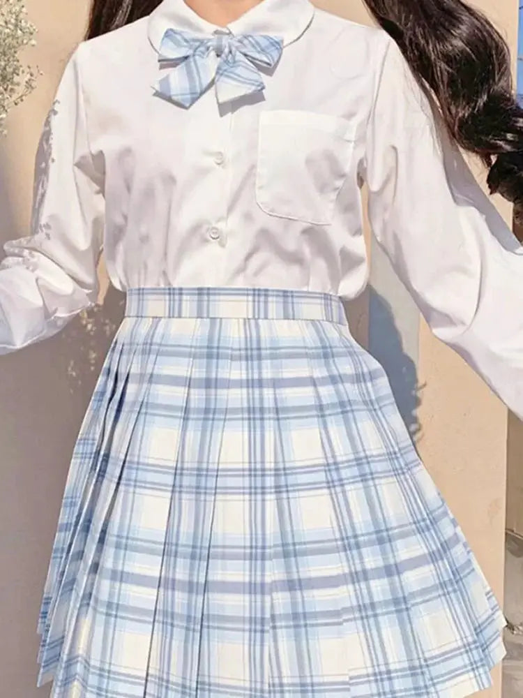 ZOKI plaid women's pleated skirt, high-waist blue and white plaid, shown with white blouse and bow necktie