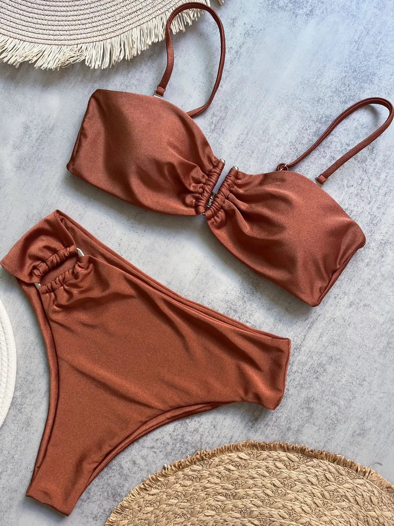 Rust-brown bandeau bikini set with ruched center top, adjustable straps, and ruched sides on bottoms