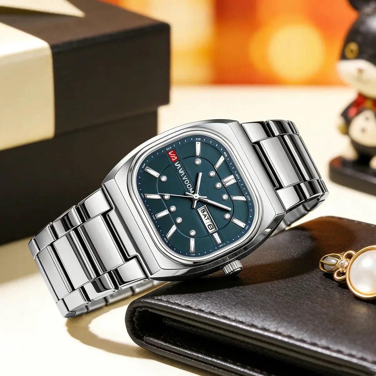Men's cushion-shaped stainless steel watch with blue dial and day-date window on a metal bracelet