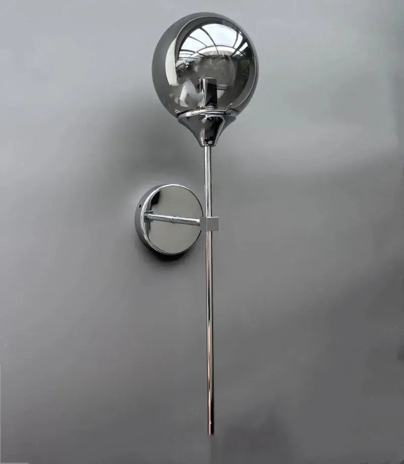 Modern glass wall lamp with chrome finish, round glass globe, wall-mounted Nordic bedside light