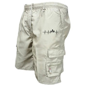 Men's cargo shorts by Simples Market in beige, loose-fit, multi-pocket with drawstring.