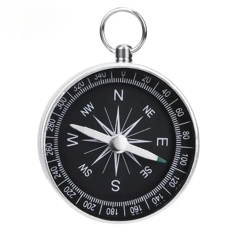 Mini aluminum alloy compass keychain pendant by Simples Market with black dial.