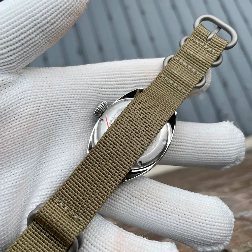 STEELFLIER SF745 wristwatch with tan nylon strap and stainless steel case back, unisex