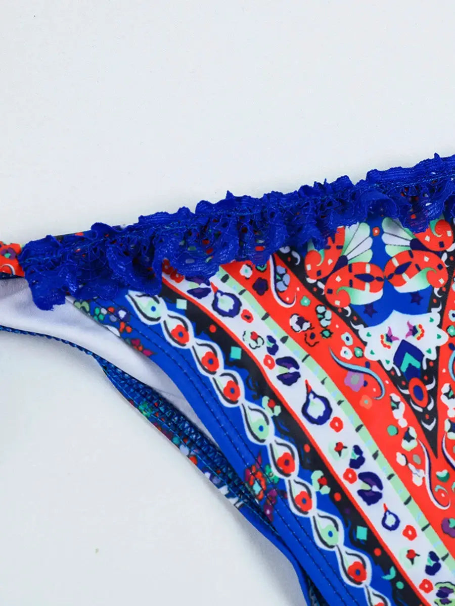 Simples Market women's bikini bottom with blue lace trim and colorful print, part of a two-piece swimsuit