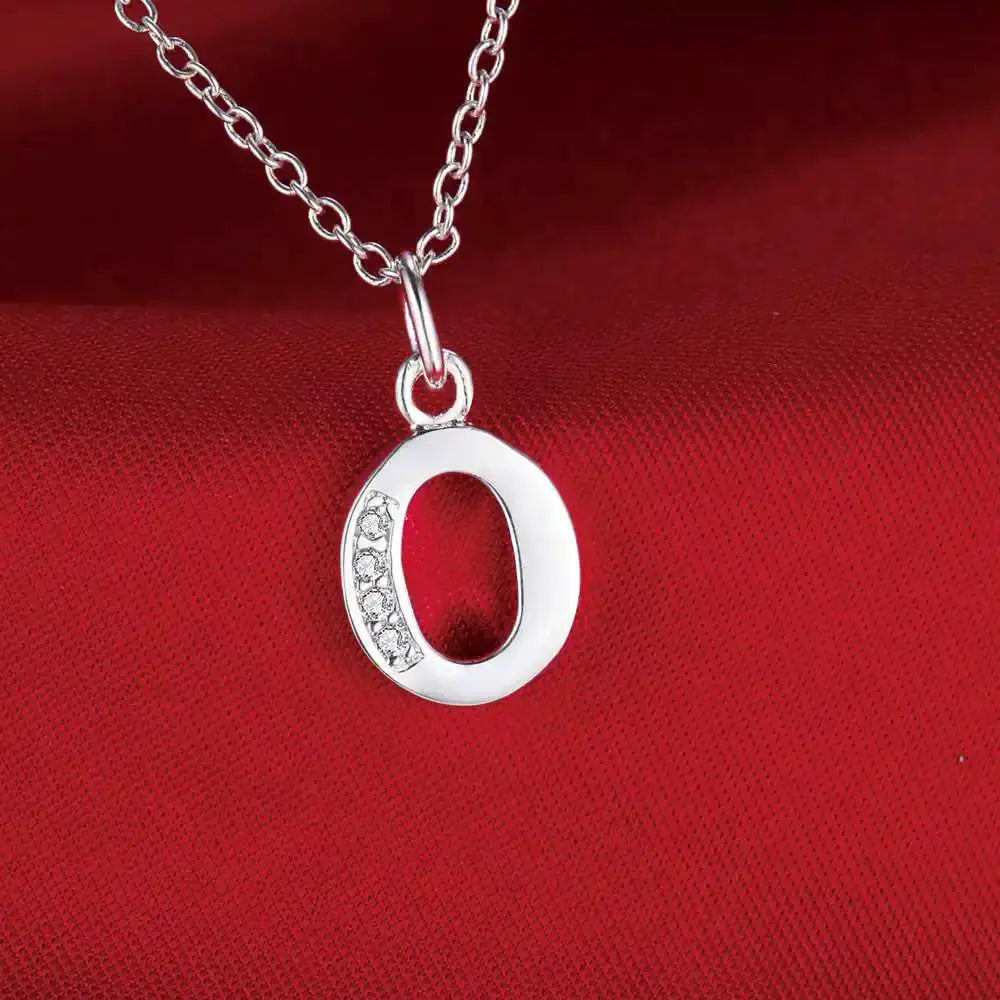 Sterling silver circle pendant necklace for women with zircon stones along the left arc