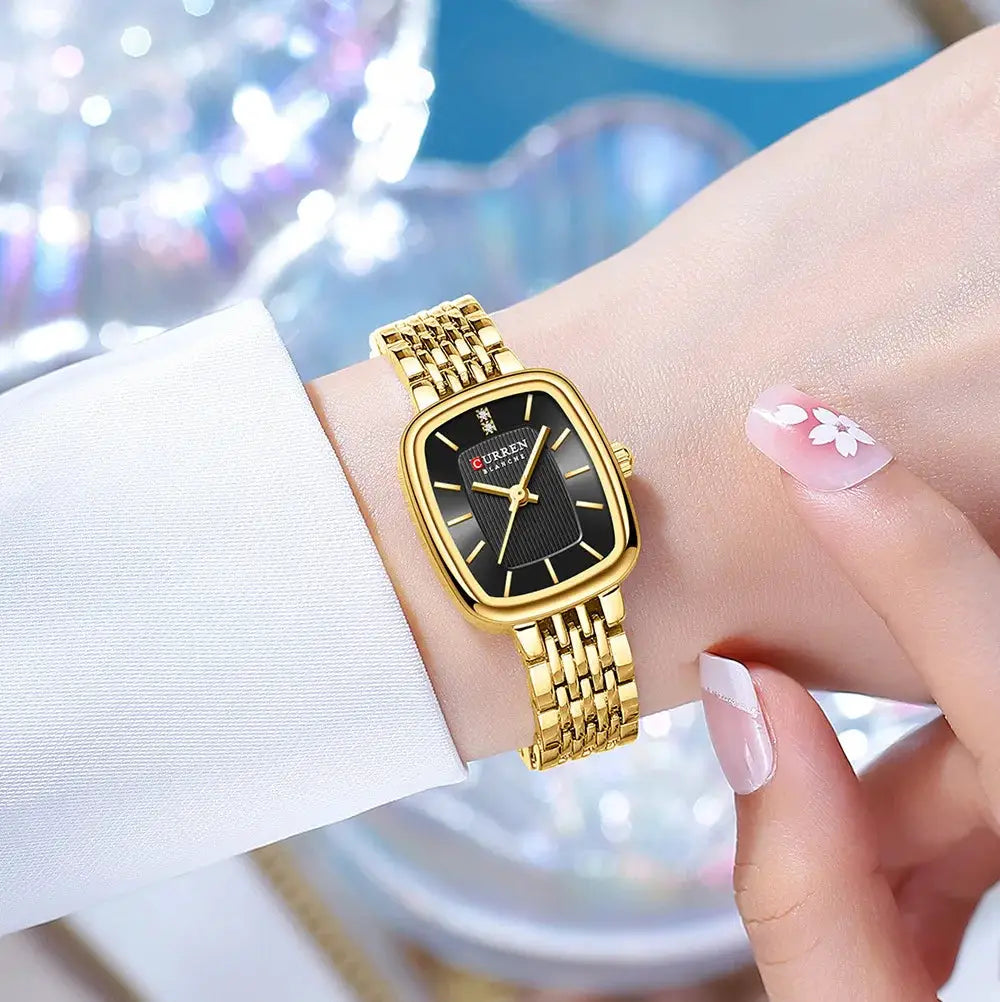 CURRN 9093 women's gold-tone quartz wristwatch with black dial and diamond accents, Simples Market