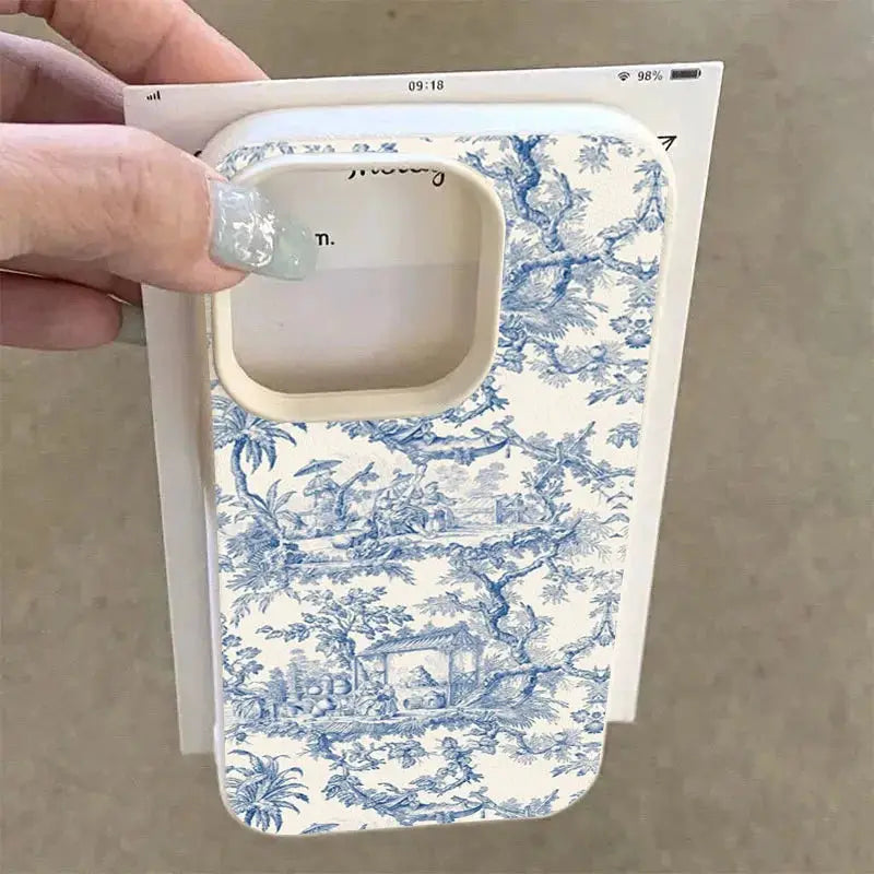 iPhone case with blue and white toile pattern; Simples Market shockproof soft cover.