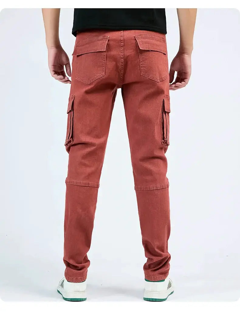 Men's red denim cargo pants with side and back pockets, slim fit