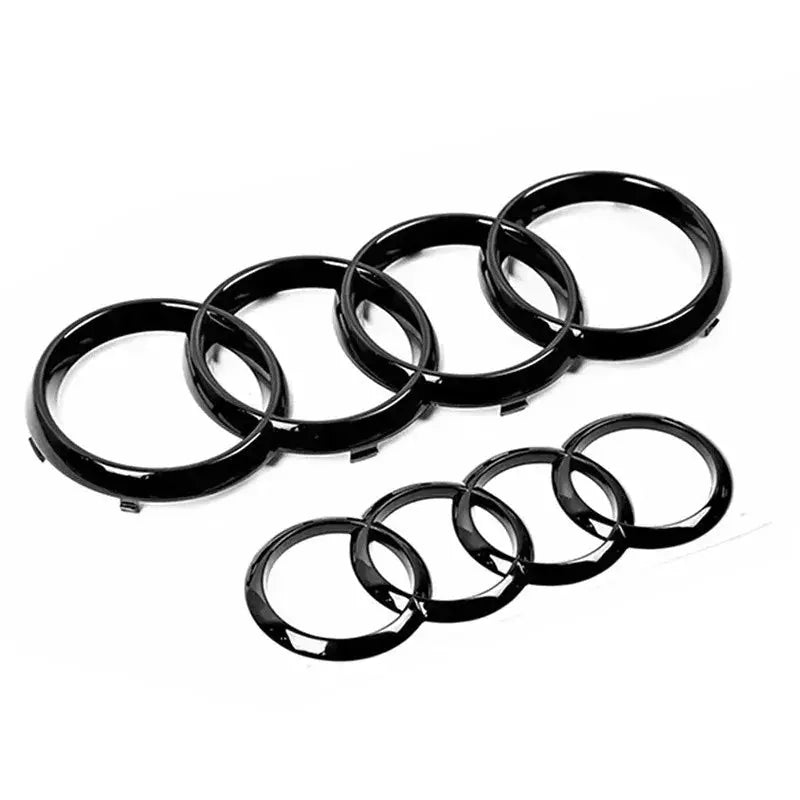 Audi four-ring emblem badge set in black ABS plastic for hood/grille and rear trunk