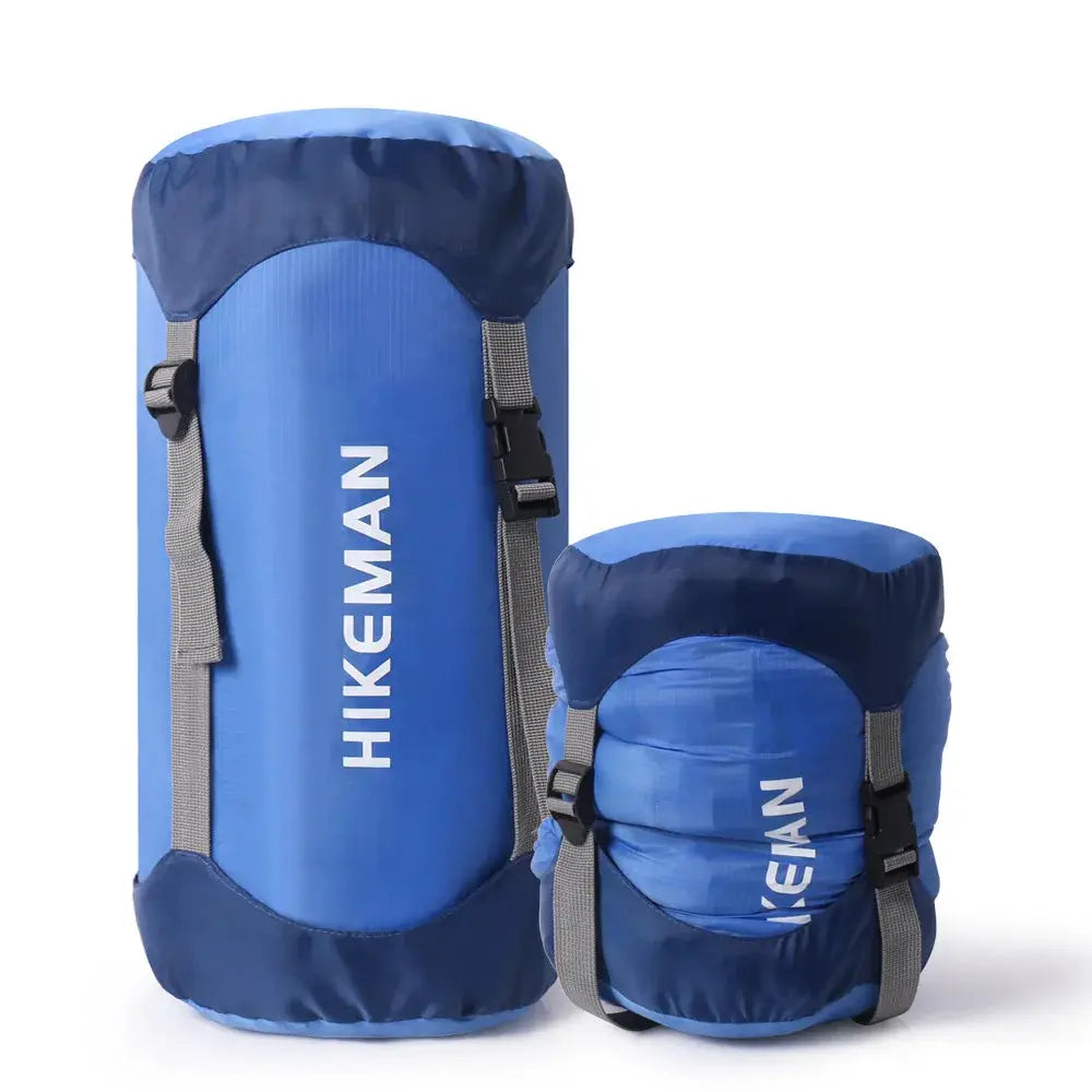 Sleeping bag compression storage bag set of two in blue, waterproof and ultra-light, with grey straps and HIKEMAN logo.