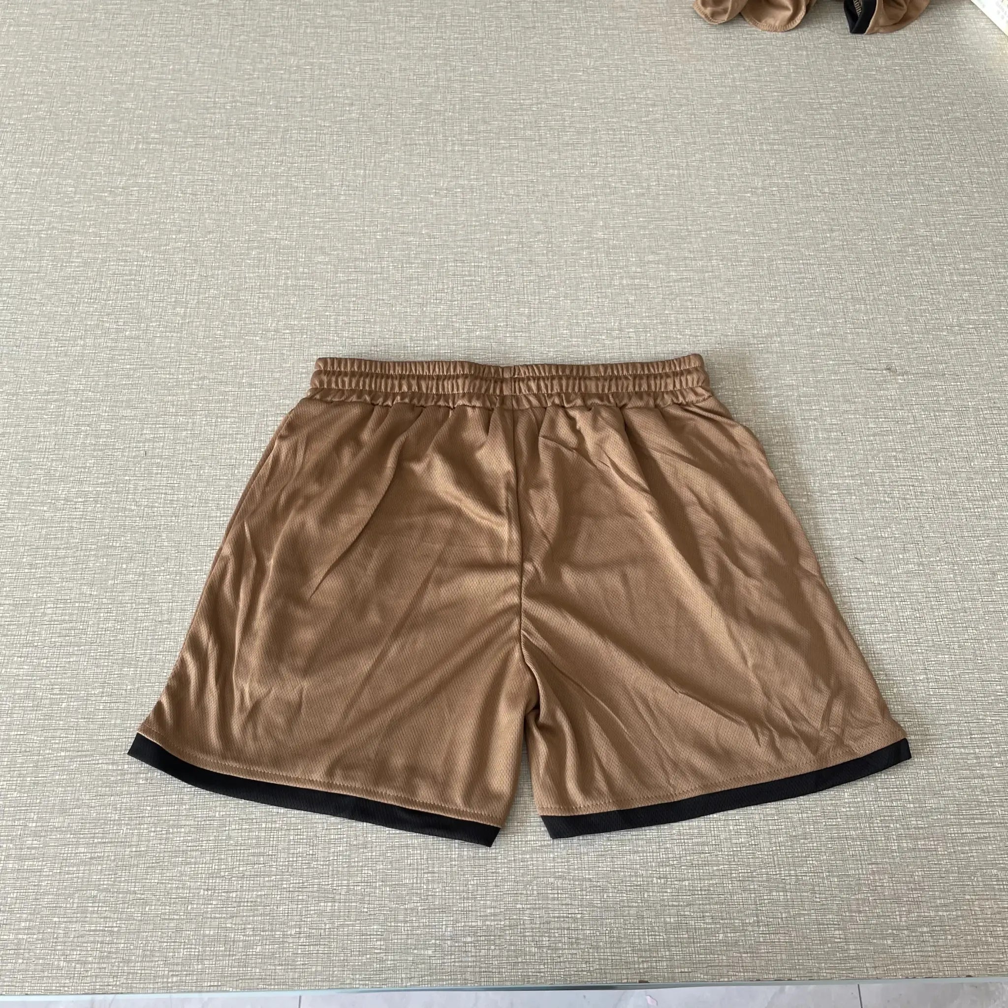 Simples Market men's brown mesh sports shorts for gym, basketball and beach workouts.