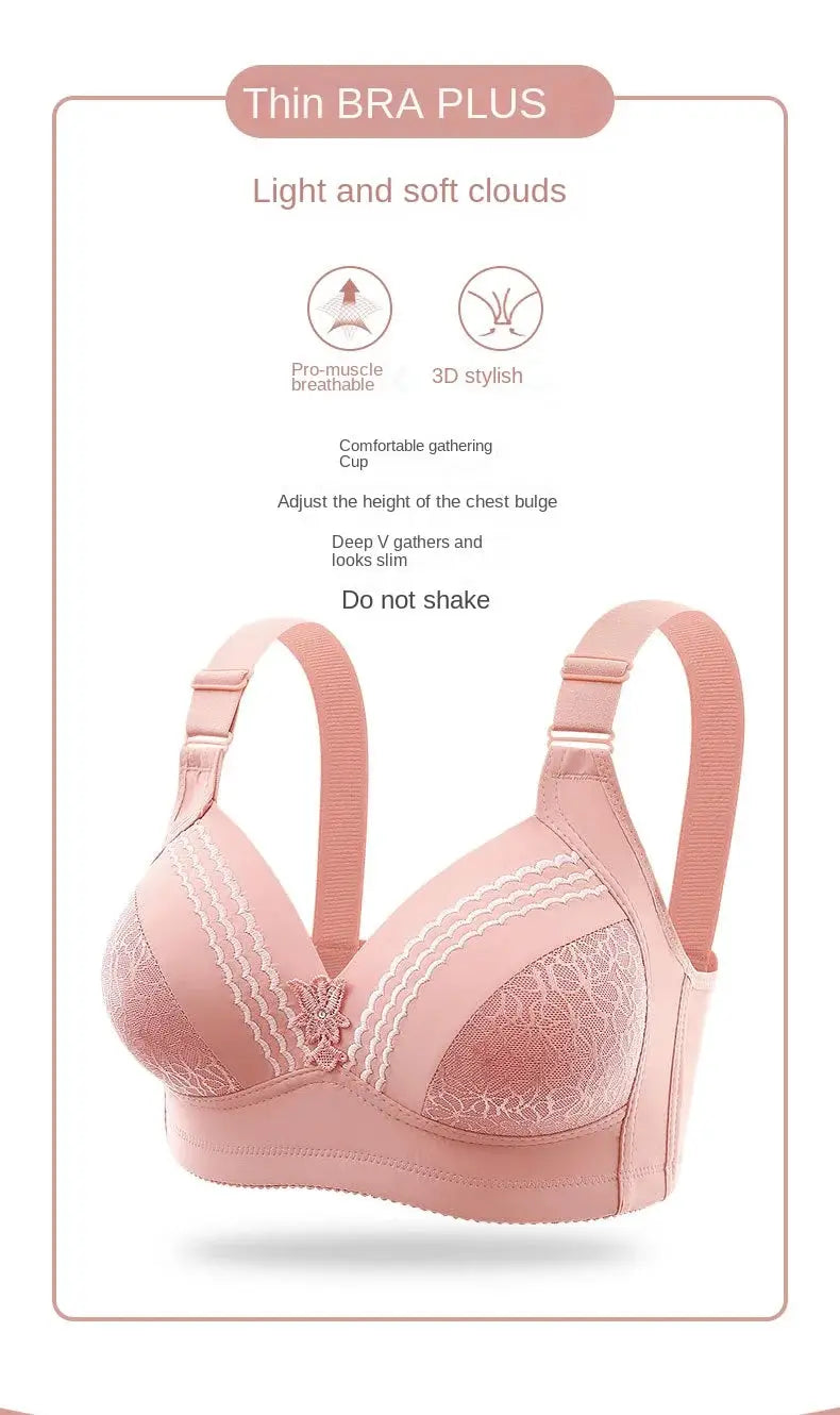 Pink lace bra with glossy satin cups, floral center applique, and wide adjustable straps with sliders
