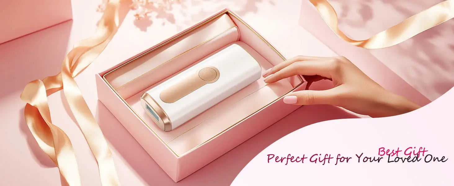 IPL hair removal device in white with blush pink accents inside a pink gift box.