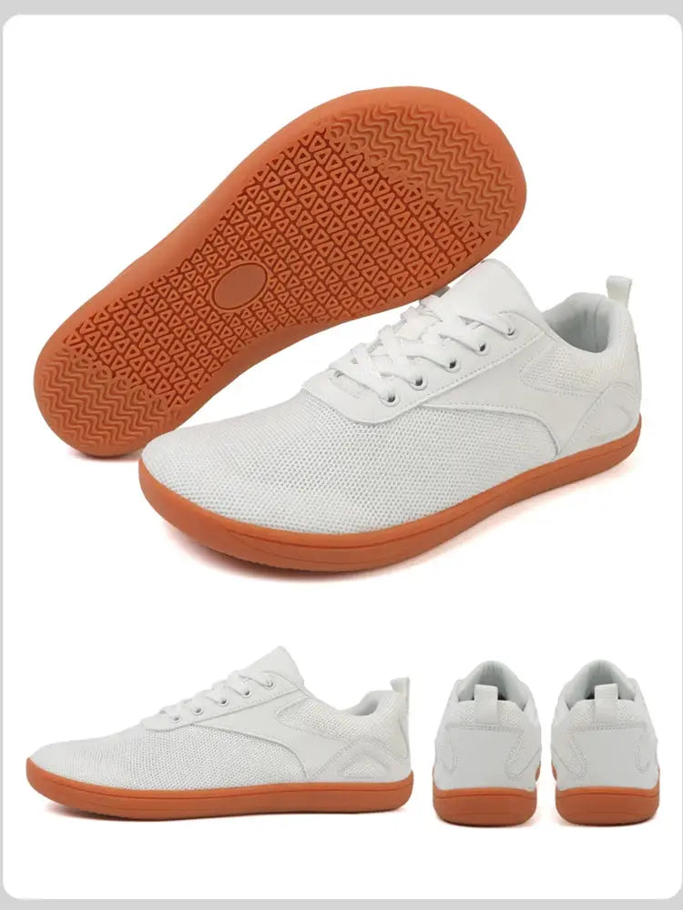 Wide-toed shoes by Simples Market; white mesh casual sports sneakers with orange sole
