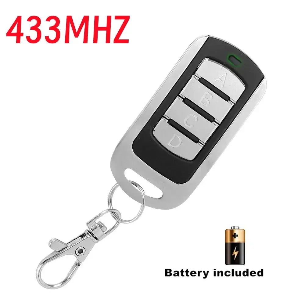 4-button garage gate remote keychain, multi-frequency, silver body with black center, battery included