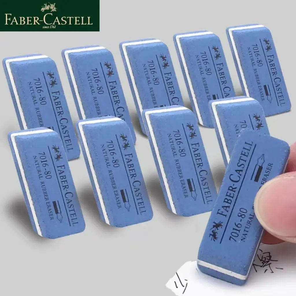 Faber-Castell blue natural rubber erasers, rectangular blocks with white edges, multiple pieces