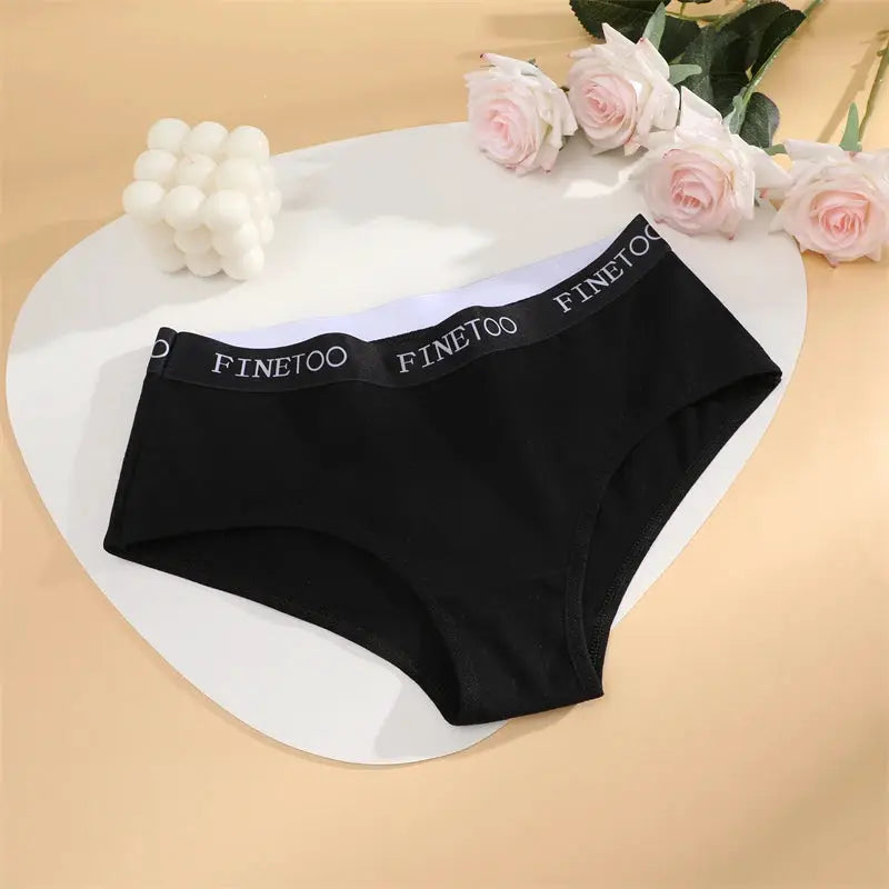 Women's black cotton briefs by Finetoo with elastic waistband