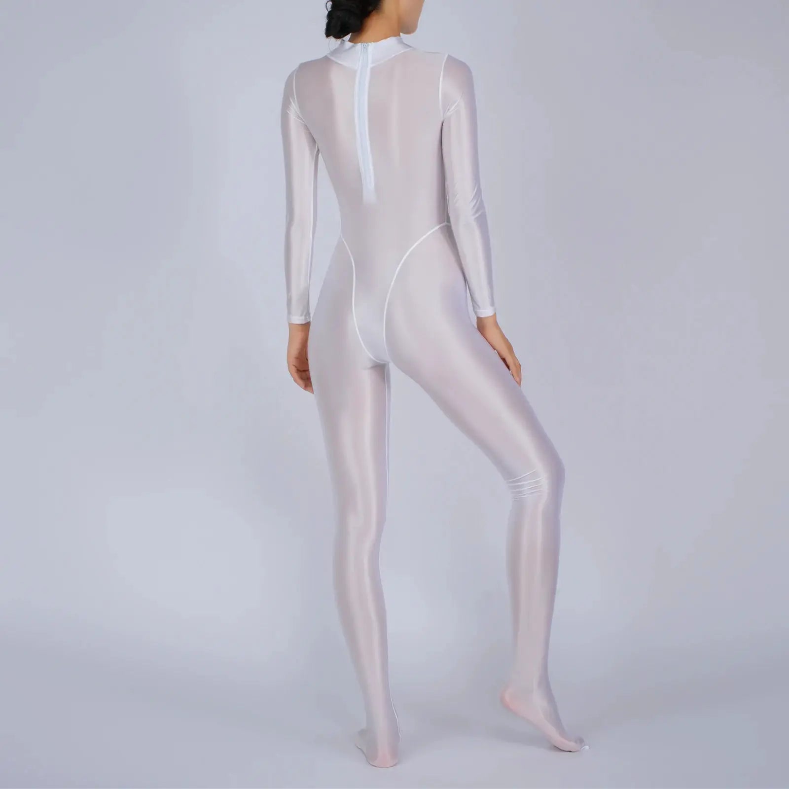 Women’s white full-body jumpsuit with long sleeves, footed legs and back zipper.