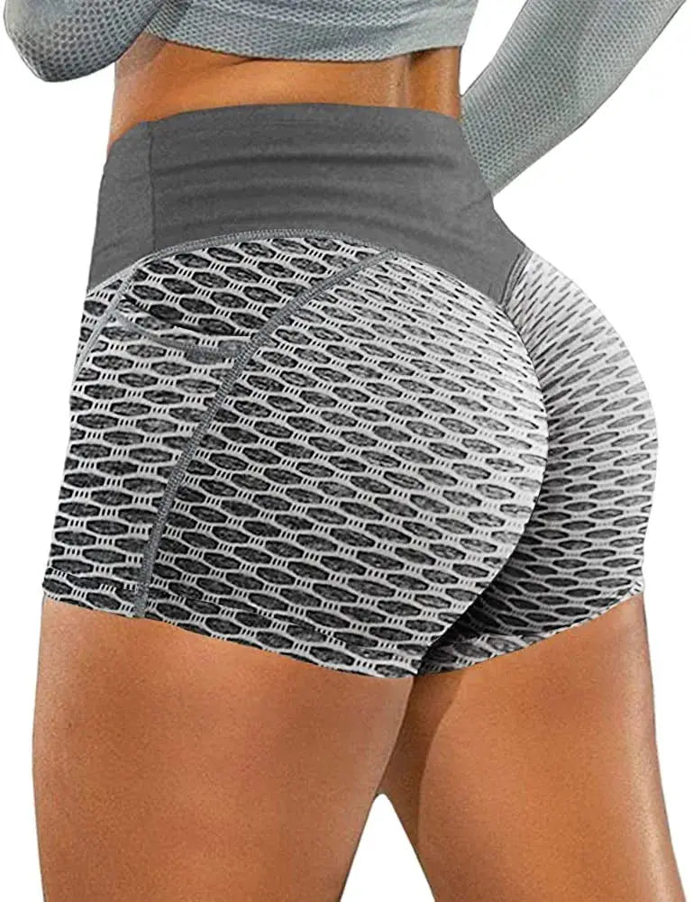 High-waist hip-lifting fitness shorts, seamless knit with gray mesh pattern.