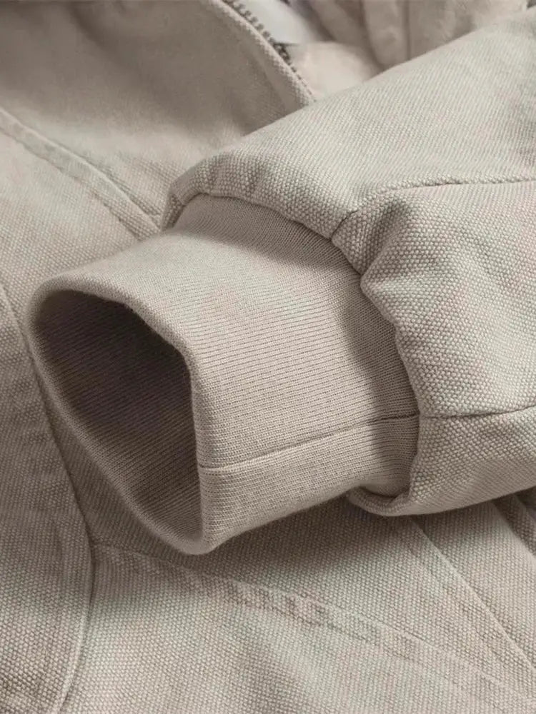 Canvas padded jacket cuff in beige with rolled sleeve detail