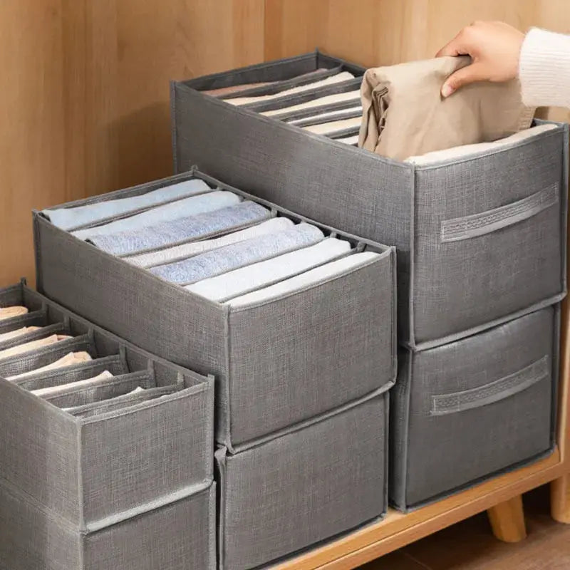 Clothes organizer storage boxes in grey fabric for wardrobe organization; stackable bins for underwear, socks and jeans
