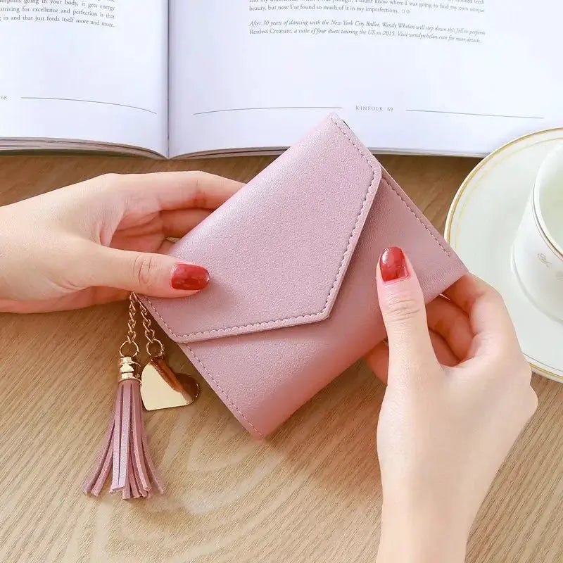 Women's pink PU leather wallet with tassel charm, small compact card holder coin purse