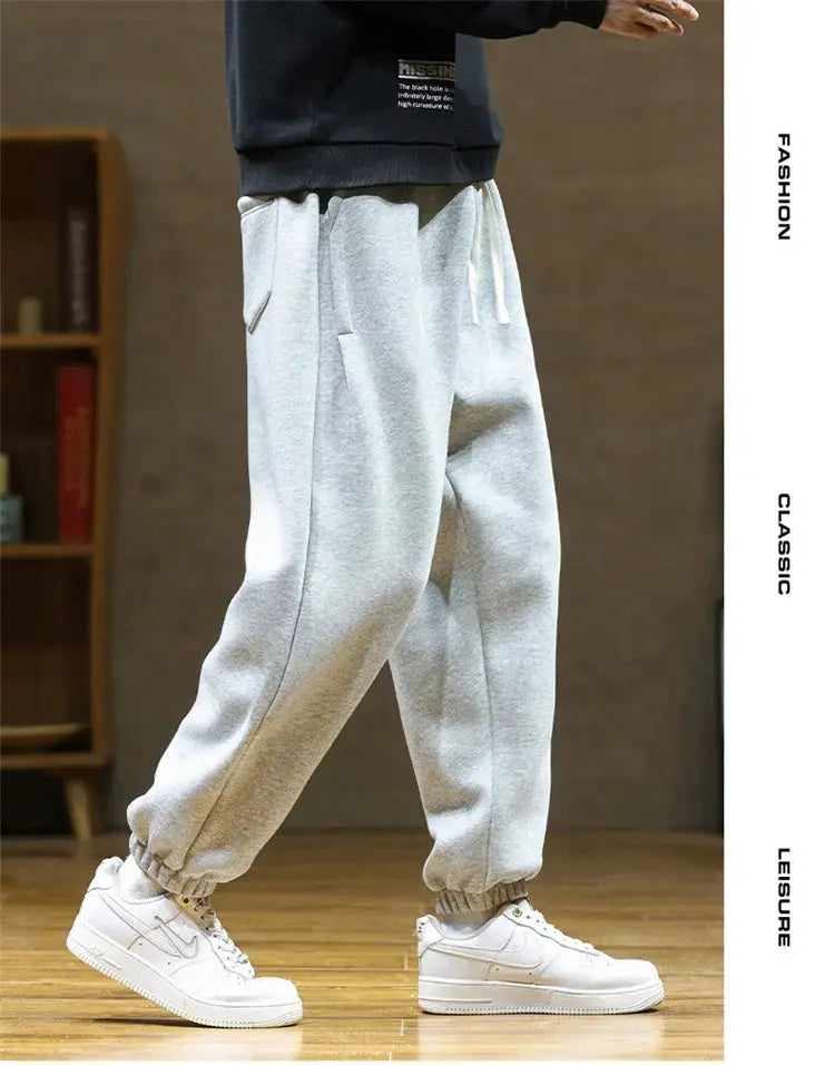 Simples Market men's grey drawstring jogger sweatpants; loose fit with pockets and elastic cuffs, size 8XL.