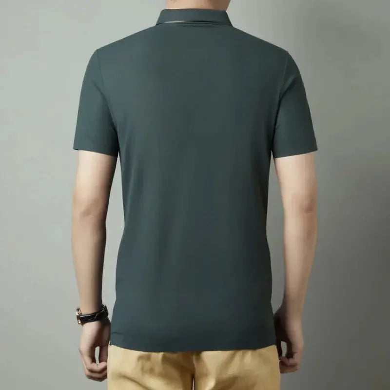 Men's polo shirt in dark green with short sleeves, seamless premium fabric.