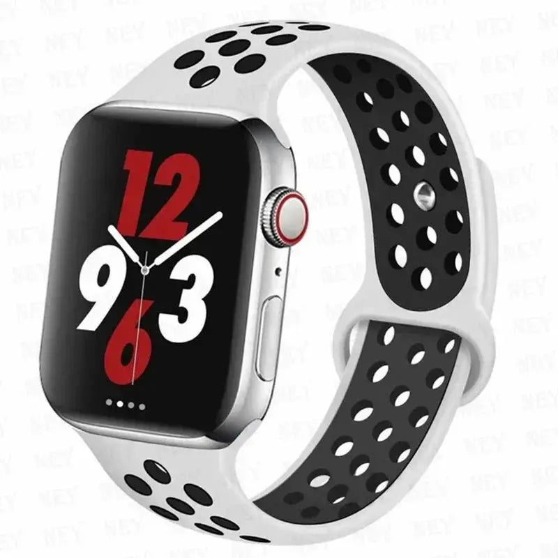 Silicone sport strap for Apple Watch, white with black perforated holes, fits 38–45mm models