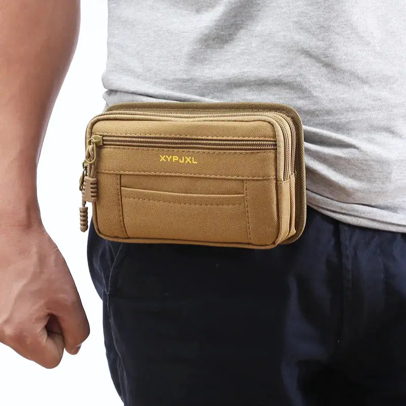Waist pack in tan nylon with multiple zip pockets; XYPUXL logo visible
