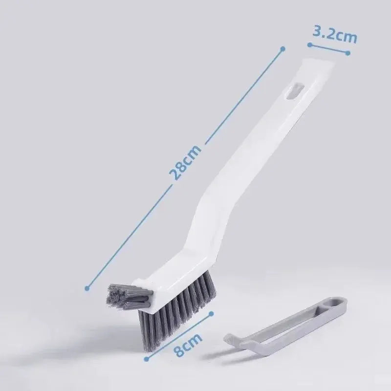 Effective 2-in-1 cleaning brush for corners and gaps by Simples Market, white handle with gray bristle head