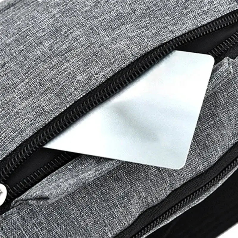 Simples Market waist bag in gray fabric with zip pockets and a card pocket
