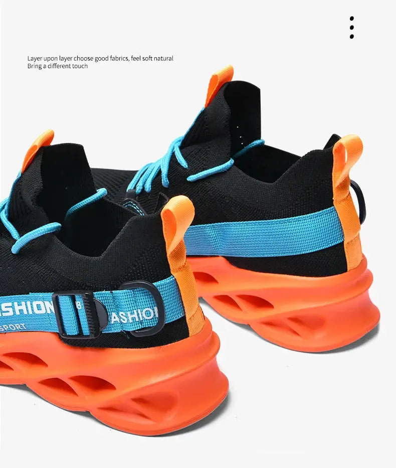 Pair of sneakers with black mesh upper, bright orange thick sole, blue straps and laces