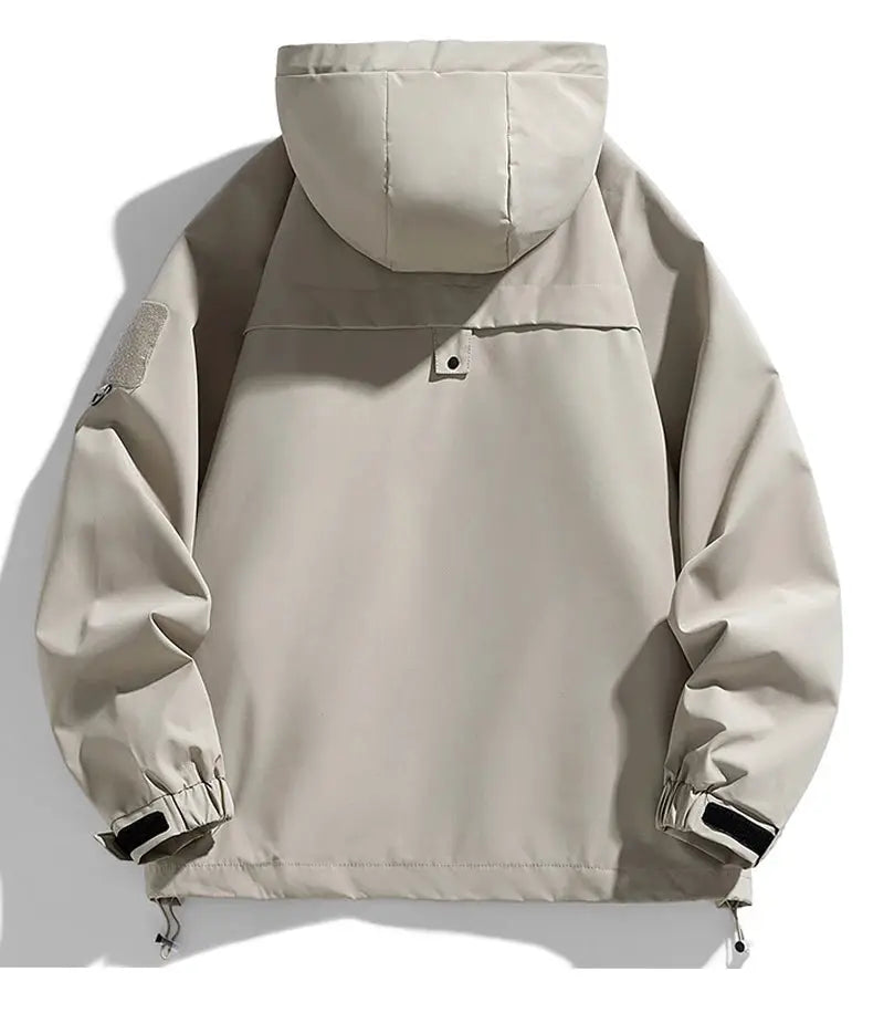 Beige hooded windbreaker jacket for men; lightweight softshell with adjustable cuffs and drawcord hem