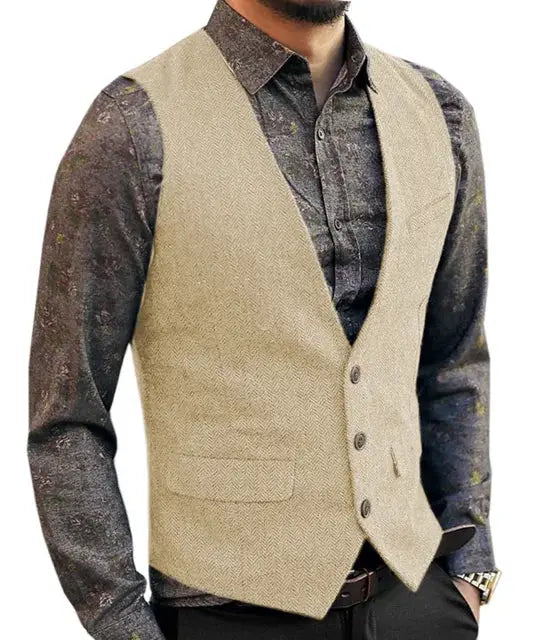 Beige herringbone deep-V suit vest, slim-fit waistcoat for formal wedding attire over a dark shirt look.